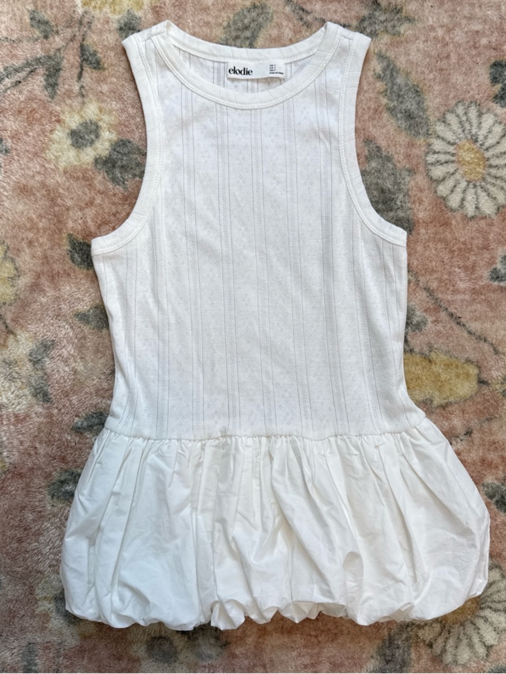 Elodie White Sleeveless Ruffled Hem Tank